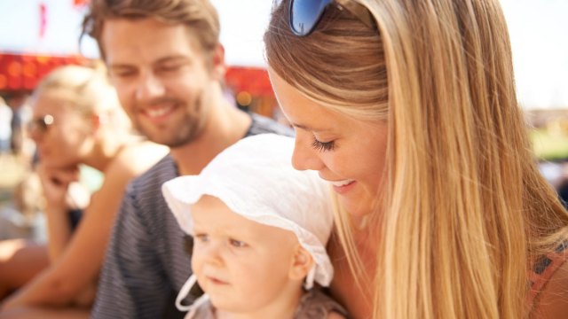 baby at a music festival with parents