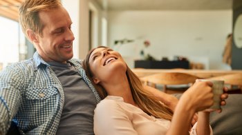 happy but tired parents spending time together