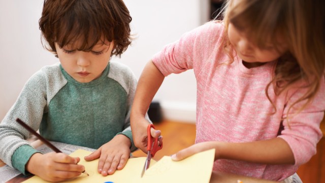 kids doing button crafts