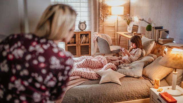 mom looking into her daughter's room