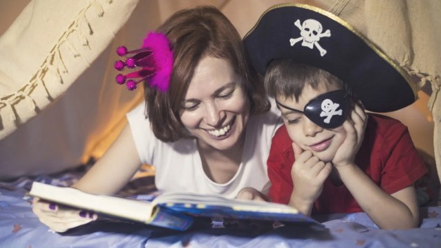mom reading funny pirate jokes for kids