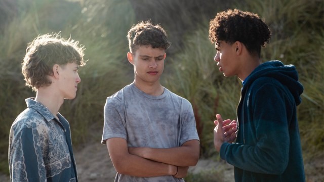 a picture of three boys learning about how to deal with peer pressure