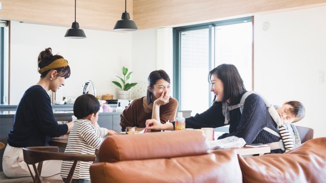A group of moms hanging with their kids, all of whom have a different zodiac signs personality and parenting style
